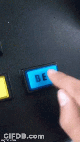 A Person Is Pressing A Blue Be Button With Their Finger GIF