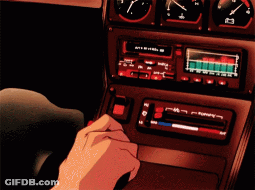 A Person Is Pressing A Button On A Car Radio That Says ' A ' On It GIF