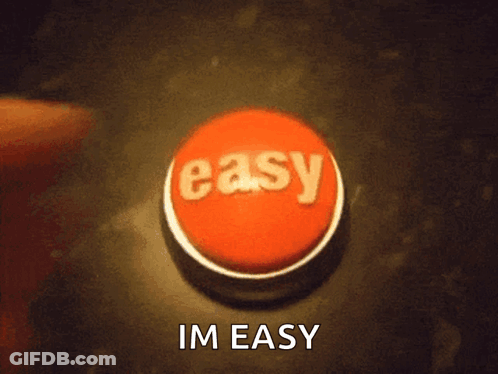 A Person Is Pressing A Red Button With The Word Easy On It GIF