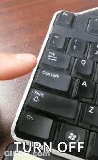 A Person Is Pressing The Shift Key On A Keyboard With The Words Turn Off Below It GIF