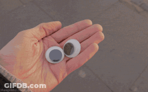 A Person Is Putting A Coin Into A Post Box That Says Office GIF