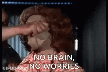 A Person Is Putting A Mask On Another Person 'S Face . GIF