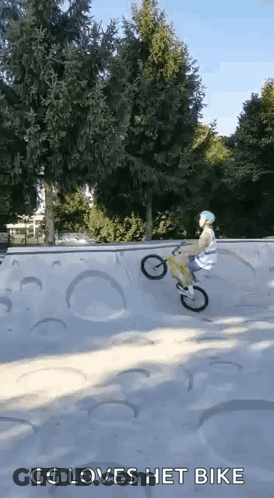 A Person Is Riding A Bike On A Ramp At A Skate Park And The Caption Says Gg Loves Het Bike . GIF