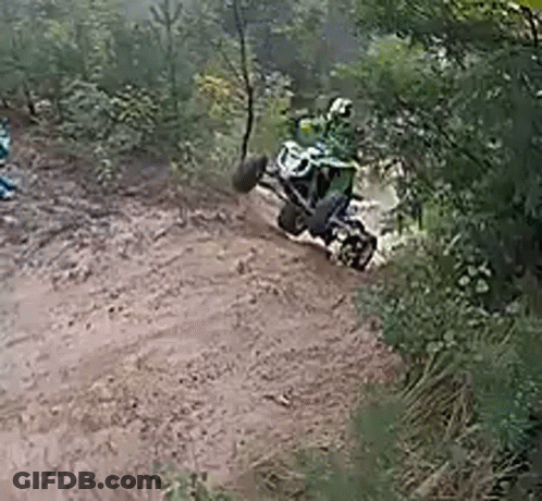 Person Riding Dirt Bike On Dirt Road GIF