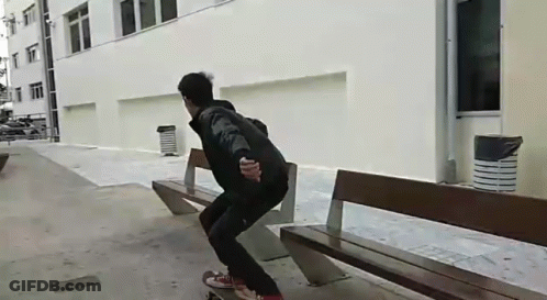 A Person Is Riding A Skateboard On A Bench GIF