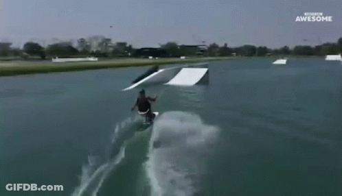 A Person Is Riding A Wakeboard On A Ramp And The Words Awesome Are On The Bottom Of The Screen GIF