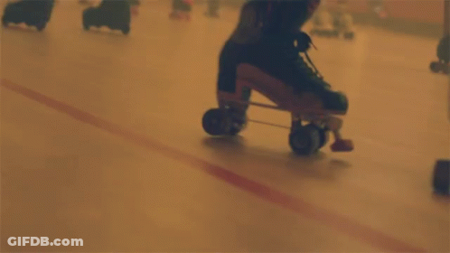 A Person Is Rollerblading On A Rink In A Blurry Photo GIF