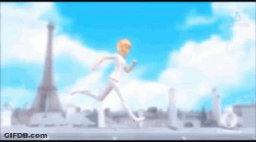 A Person Is Running In Front Of The Eiffel Tower . GIF