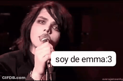 A Person Is Singing Into A Microphone With A Speech Bubble That Says `` Soy De Emma '' . GIF