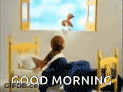 A Person Is Sitting In A Bed Looking Out A Window With The Words Good Morning Written On The Bottom GIF
