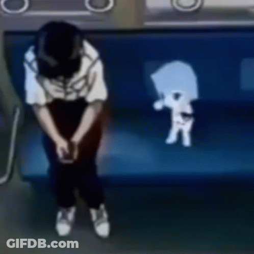 A Person Is Sitting On A Blue Couch With A Skeleton On The Back Of It . GIF