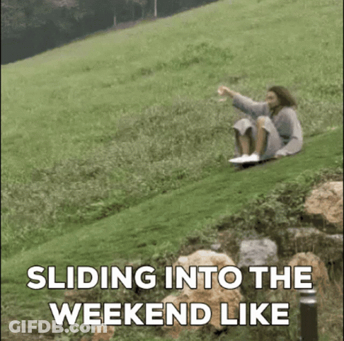 A Person Is Sitting On A Grassy Hill With The Words Sliding Into The Weekend Like GIF