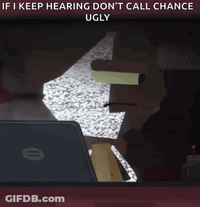 A Person Is Smoking A Cigarette While Looking At A Laptop Computer . GIF