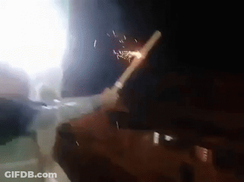 A Person Is Smoking A Cigarette With A Straw In Their Mouth . GIF