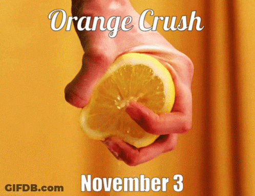 A Person Is Squeezing A Lemon With The Date November 3 On The Bottom GIF