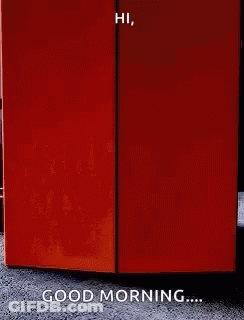 A Person Is Standing In Front Of A Door That Says Good Morning GIF