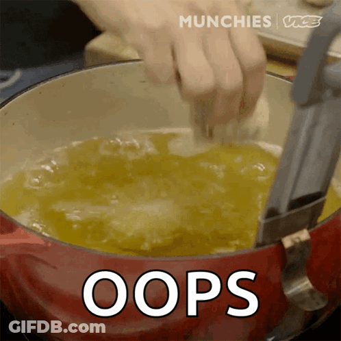 A Person Is Stirring Something In A Pot With The Word Oops Written On It GIF