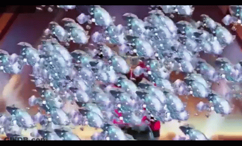 A Person Is Surrounded By A Bunch Of Mice . GIF