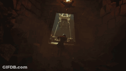 A Person Is Swimming In A Dark Room With A Light Shining Through A Window GIF