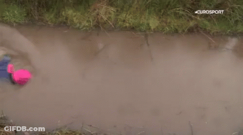 A Person Is Swimming In A Muddy Stream With Eurosport In The Corner GIF