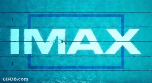 A Person Is Swimming In A Pool With The Word Imax Above Them GIF