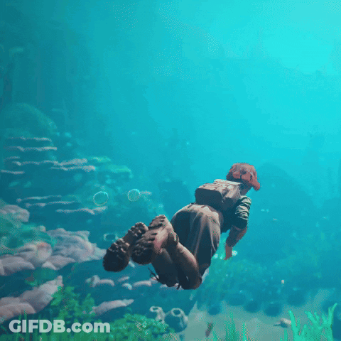 A Person Is Swimming In The Ocean With A Soccer Ball In Their Hand GIF