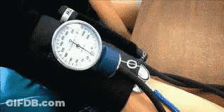 A Person Is Taking Their Blood Pressure With A Sphygmomanometer On Their Wrist GIF