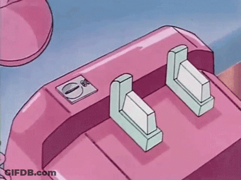 A Person Is Talking On A Pink Telephone With A Green Button . GIF
