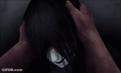 A Person Is Touching A Woman 'S Head With Their Hand GIF
