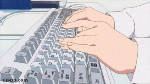 A Person Is Typing On A Keyboard With The Esc Key In The Middle GIF
