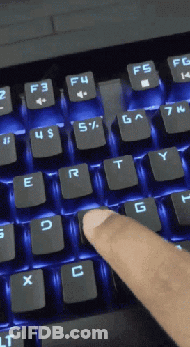 A Person Is Typing On A Keyboard With The F4 Key Highlighted In Blue GIF