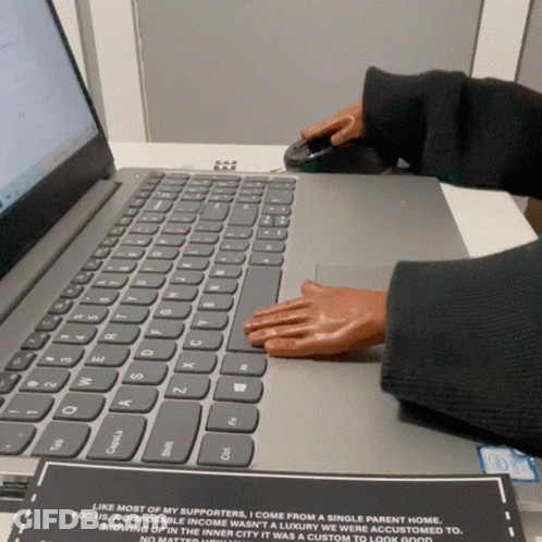 A Person Is Typing On A Laptop With A Card That Says Like Most Of My Supporters GIF