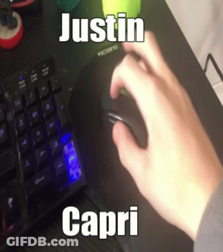 A Person Is Using A Computer Mouse With The Name Justin Capri On The Keyboard GIF
