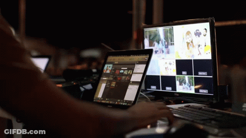 A Person Is Using A Dell Computer And A Dell Tablet GIF