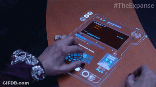 A Person Is Using A Futuristic Device That Says Where They On It GIF