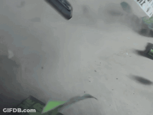 A Person Is Using A Pen To Write On A Piece Of Paper With A Green Screen GIF