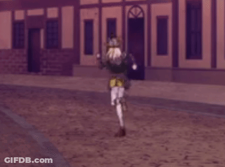 A Person Is Walking Down A Dirt Street In Front Of A Building . GIF