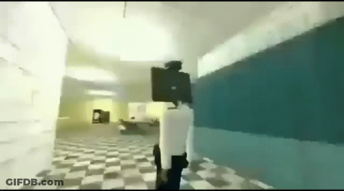 A Person Is Walking Down A Hallway In A Video Game With A Gun In Their Hand . GIF