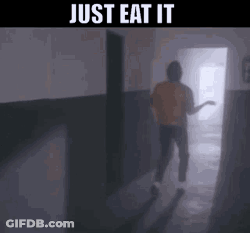 A Person Is Walking Down A Hallway With The Words `` Just Eat It '' Written On The Bottom . GIF