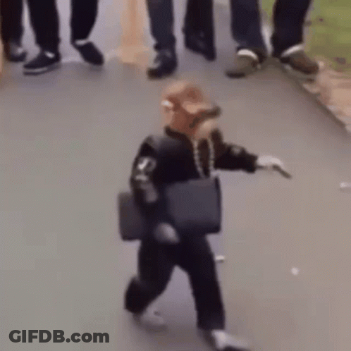 A Person Is Walking Down The Street With A Bag On Their Shoulder . GIF