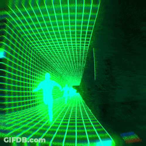 A Person Is Walking Through A Tunnel Of Green Light GIF