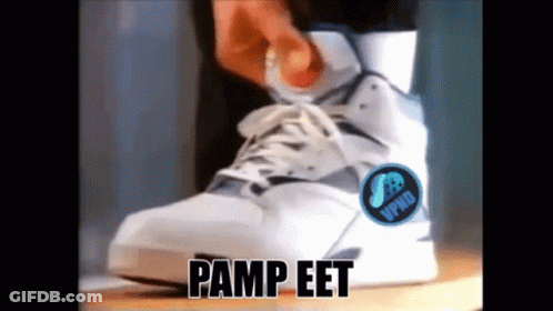 A Person Is Wearing A Pair Of Pump Eet Sneakers GIF