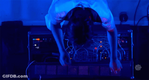 A Person Is Working On A Device That Has The Word Modular On The Front GIF
