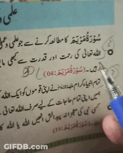 A Person Is Writing In A Book With A Pen GIF
