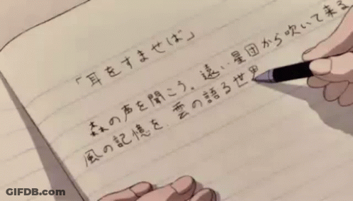 A Person Is Writing In A Notebook With Chinese Characters GIF