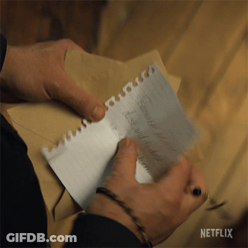 A Person Is Writing On A Piece Of Paper With A Netflix Logo In The Corner GIF