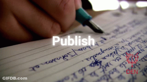 A Person Is Writing On A Piece Of Paper With The Word Publish Written On It GIF