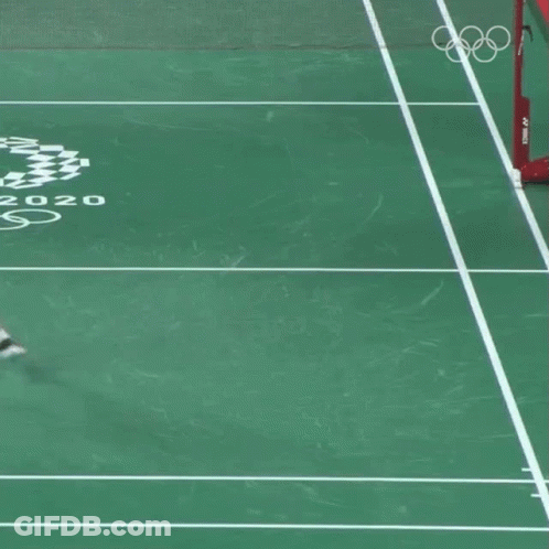 A Person Kneeling On A Tennis Court With The Year 2020 GIF