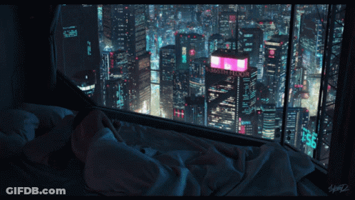 A Person Laying In A Bed Looking Out A Window At A City At Night With A Sign That Says " Floor " GIF