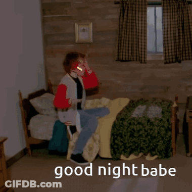 A Person Laying In A Bed With The Words Good Night Babe Written On The Floor GIF